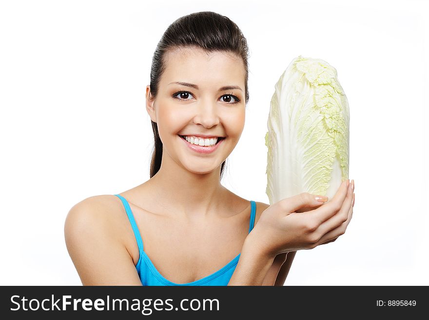 Young attractive woman holding lettuce - isolated on white. Young attractive woman holding lettuce - isolated on white