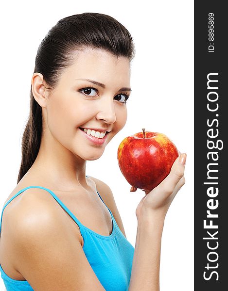 Portrait of beautiful smiling girl eating apple - isolated. Portrait of beautiful smiling girl eating apple - isolated