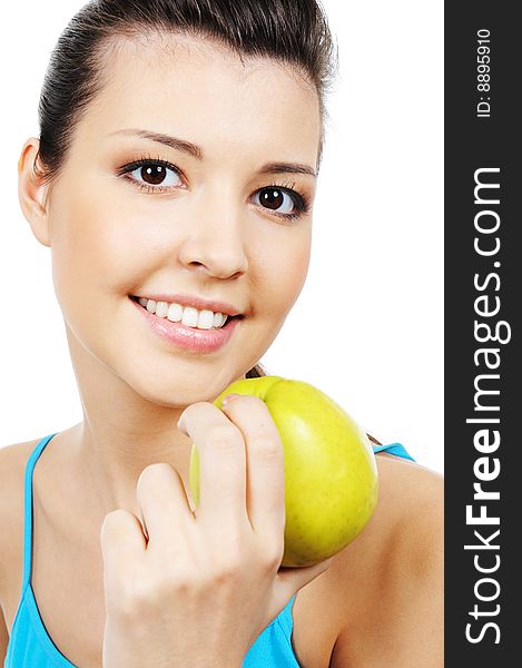 Young beautiful female face with green apple - close-up. Young beautiful female face with green apple - close-up