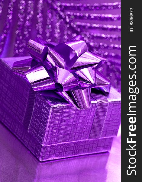 Gift Box On Violet Background