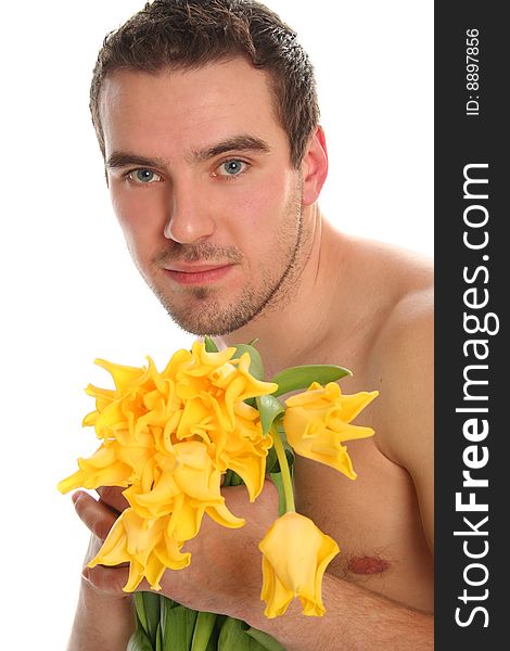 young man with yellow tulips