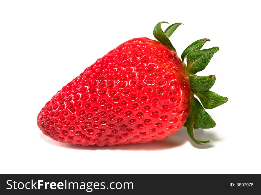 Isolated fresh strawberry on a white background.