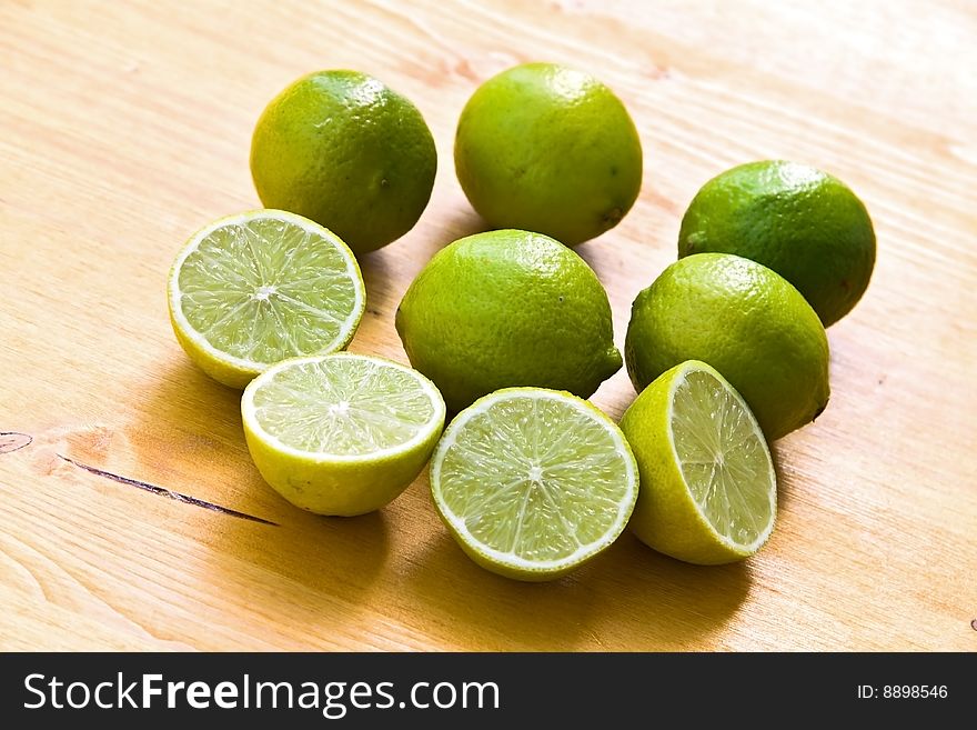 Many Ripe Limes On A Cutting Board