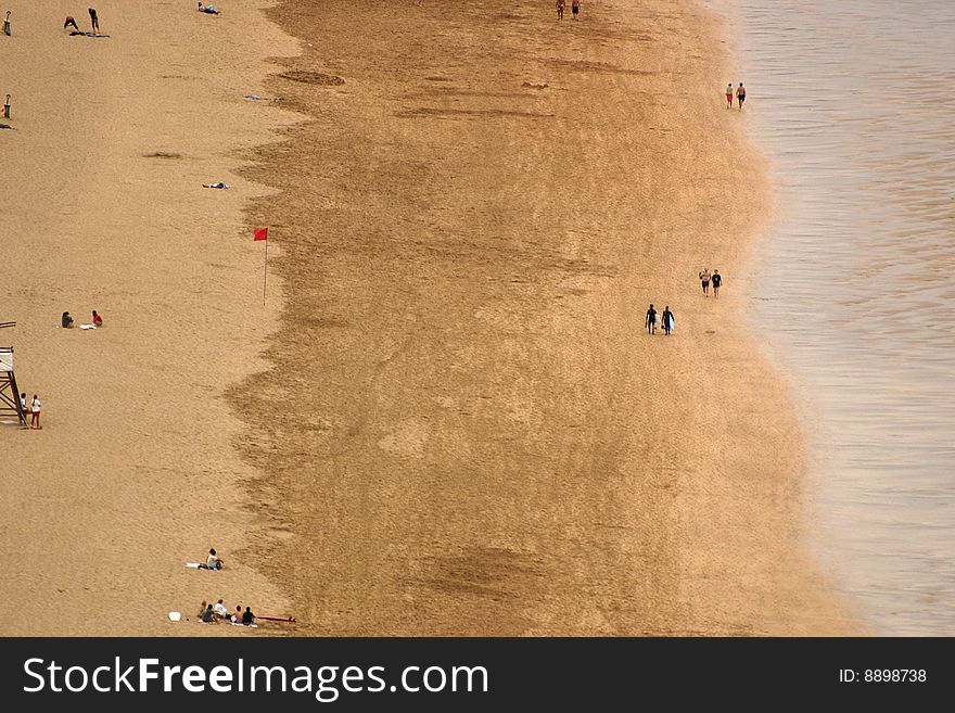 Beach with surfers