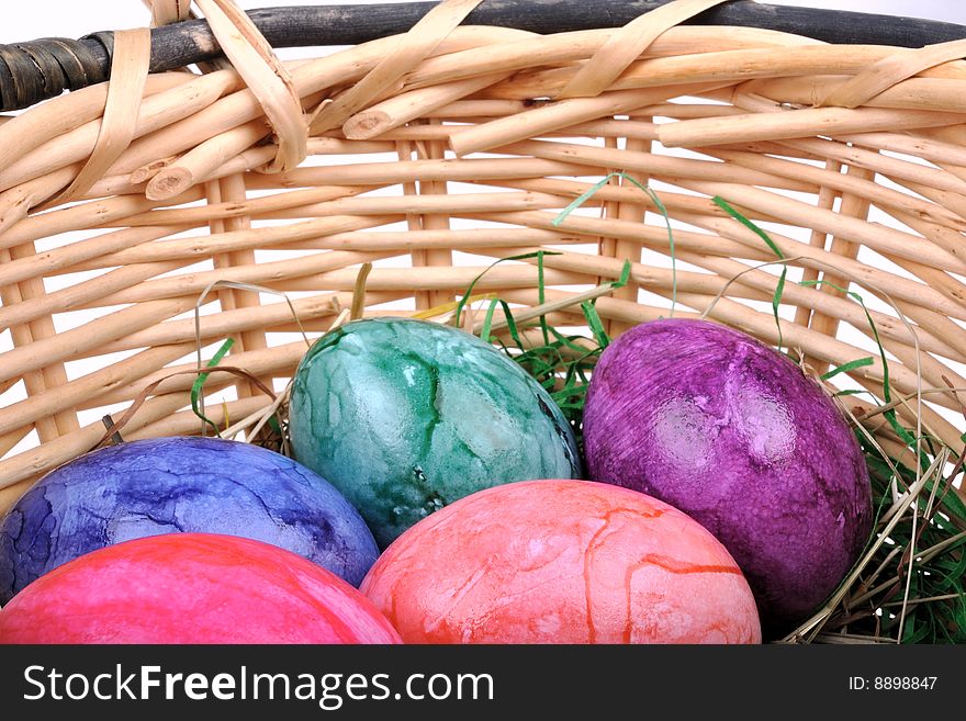 Colorful Easter eggs in one basket
