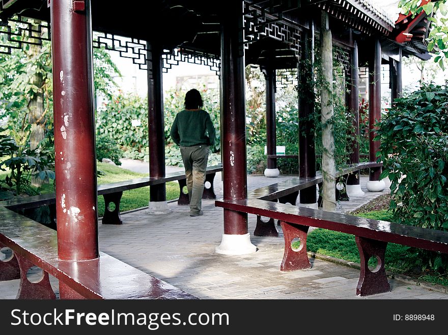 Traditional long corridor in the garden of China. Traditional long corridor in the garden of China.