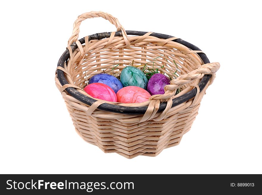 Colorful Easter eggs in one basket