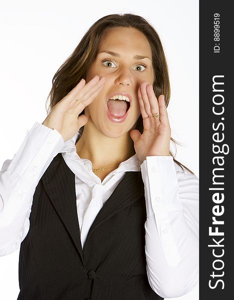 A beautiful young woman screaming with her hands near her mouth. A beautiful young woman screaming with her hands near her mouth