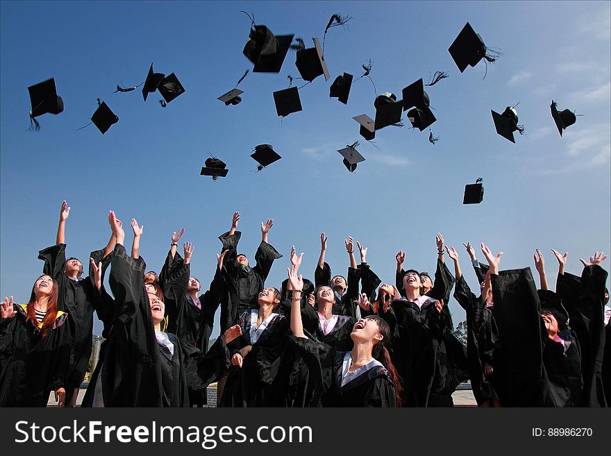 Graduates Throwing Mortarboards