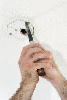 Cutting Hole For Ceiling Box Stock Image