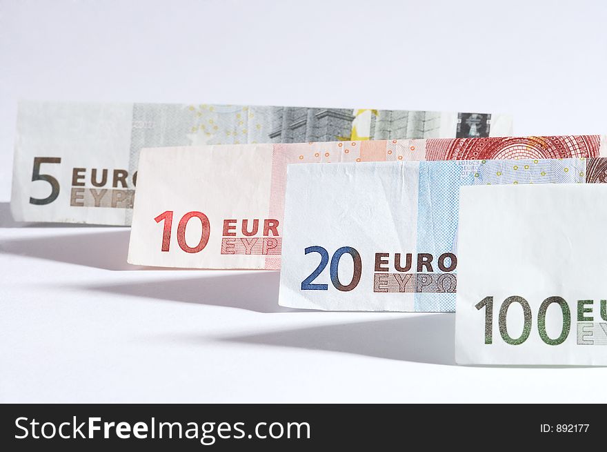 Folded papermoney on white background. Folded papermoney on white background