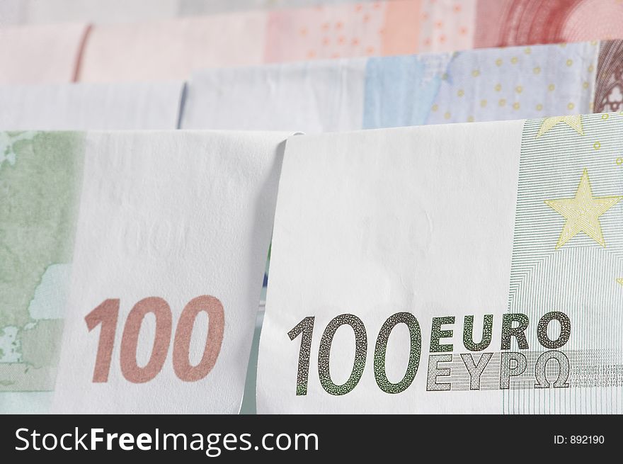 Folded papermoney on white background. Folded papermoney on white background