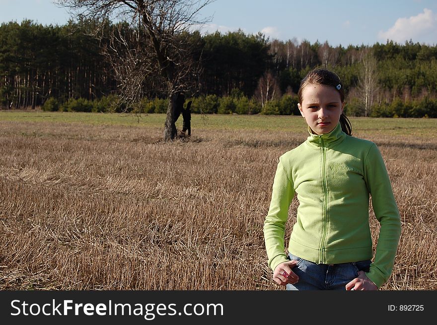 Sunny weather with shy teenager in the forest