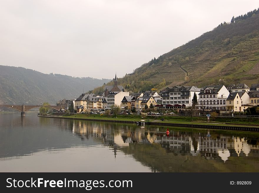 Cochem is a town in Rhineland-Palatinate, western Germany, capital of the district Cochem-Zell. It is situated in the valley of the Mosel, at the foot of a hill surrounded by a feudal castle dating from 1051.