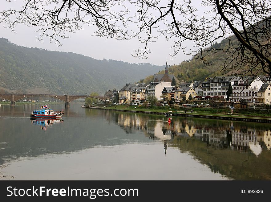 Cochem is a town in Rhineland-Palatinate, western Germany, capital of the district Cochem-Zell. It is situated in the valley of the Mosel, at the foot of a hill surrounded by a feudal castle dating from 1051.