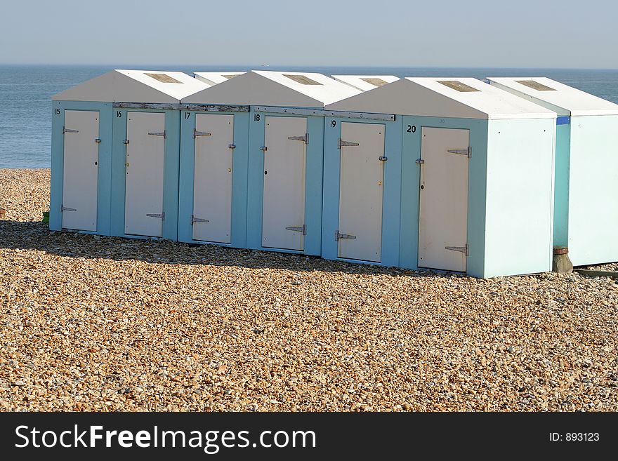 Line of seaside huts on Eastbourne beach, Sussex. Line of seaside huts on Eastbourne beach, Sussex