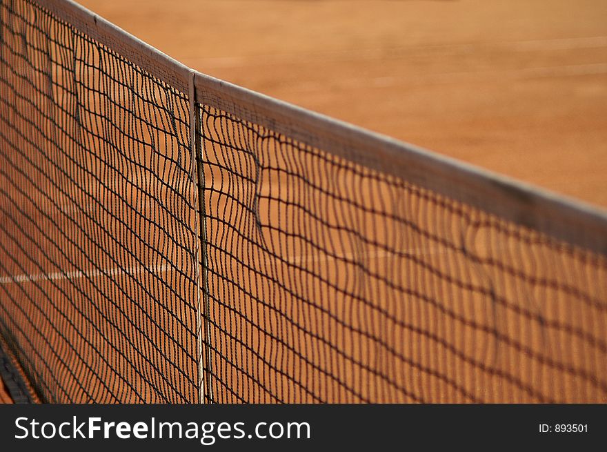 Detail of a tennis-court net, center in focus, shallow DOF. Detail of a tennis-court net, center in focus, shallow DOF