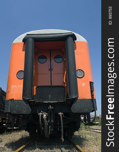 Orange waggon on railway