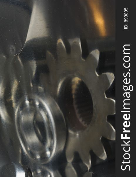 Ball-bearing and gear reflection effect from heavily curved titanium sheeth. Ball-bearing and gear reflection effect from heavily curved titanium sheeth