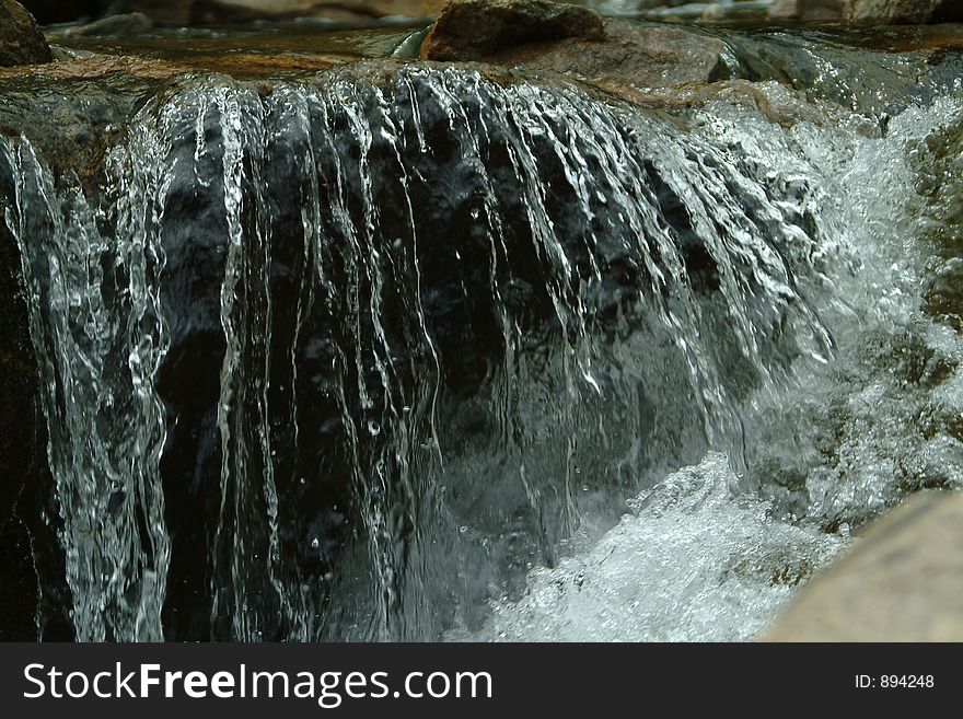 Colorado clear cool sparkling clear mountain stream water. Colorado clear cool sparkling clear mountain stream water