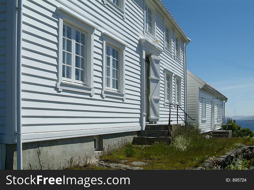 Old, traditional, wooden houses in Loshavn near Farsund, Vest-Agder on the south coast of Norway. Old, traditional, wooden houses in Loshavn near Farsund, Vest-Agder on the south coast of Norway