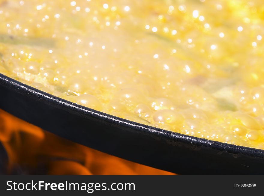 Boiling paella, typical food of Spain