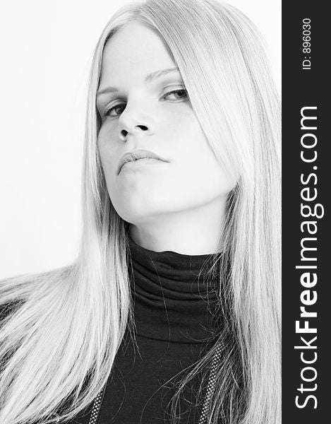 It is black a white photo of the woman with long light hair. The photo is made in a high key. By Elle Nova. It is black a white photo of the woman with long light hair. The photo is made in a high key. By Elle Nova