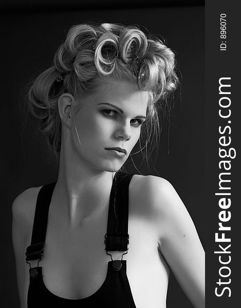 It is black a white photo of model with an evening make-up and an original hairdress. The photo is in style beauty. The photo is made with use soft filter. Photo 2. It is black a white photo of model with an evening make-up and an original hairdress. The photo is in style beauty. The photo is made with use soft filter. Photo 2