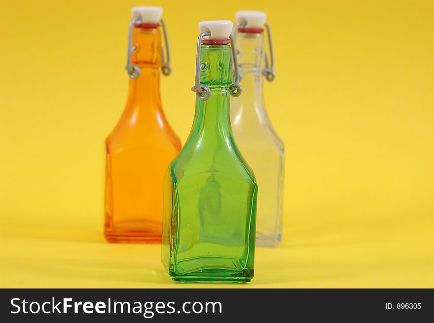 Three shiny bottles