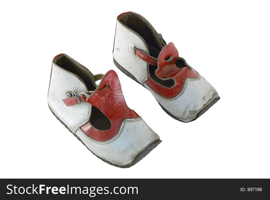 Children shoes from around 1950, isolated on white and clipping path included. Children shoes from around 1950, isolated on white and clipping path included