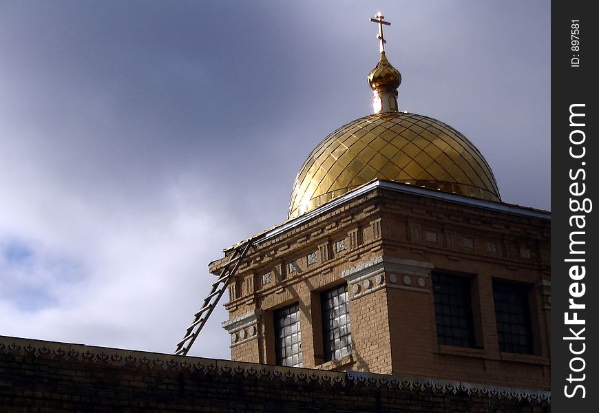 Golden dome on history church