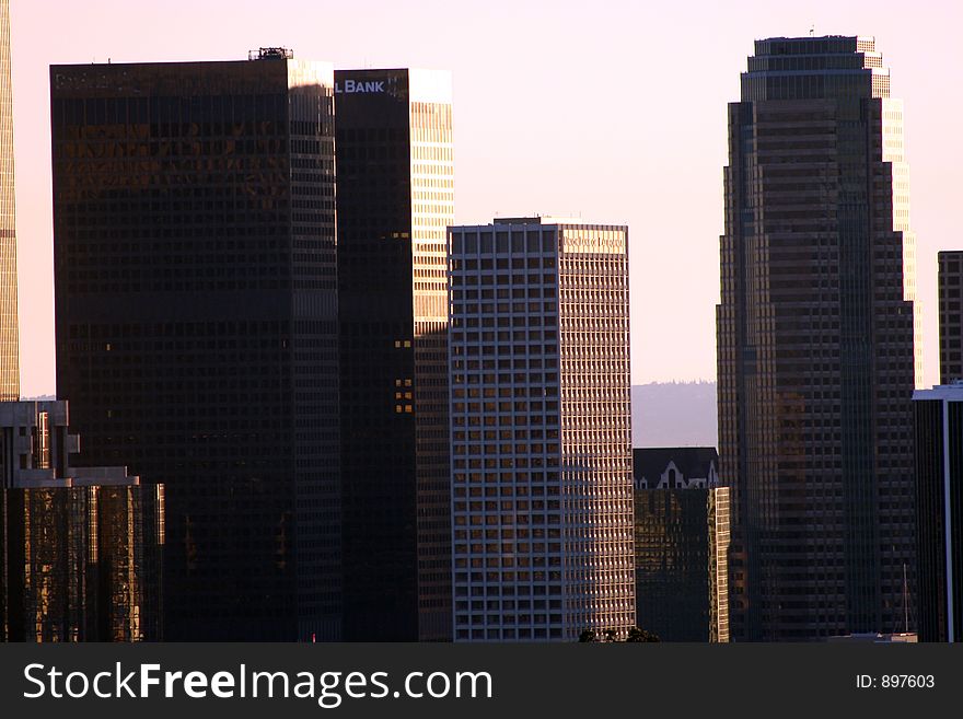 Buildings in downtown los angeles as the sun sets. Buildings in downtown los angeles as the sun sets.