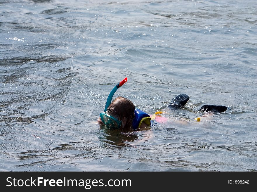 Young girl snorkeling