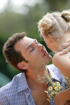 Young Man Kissing Little Girl Royalty Free Stock Photography Young Man Kissing Little Girl Royalty Free Stock Photography