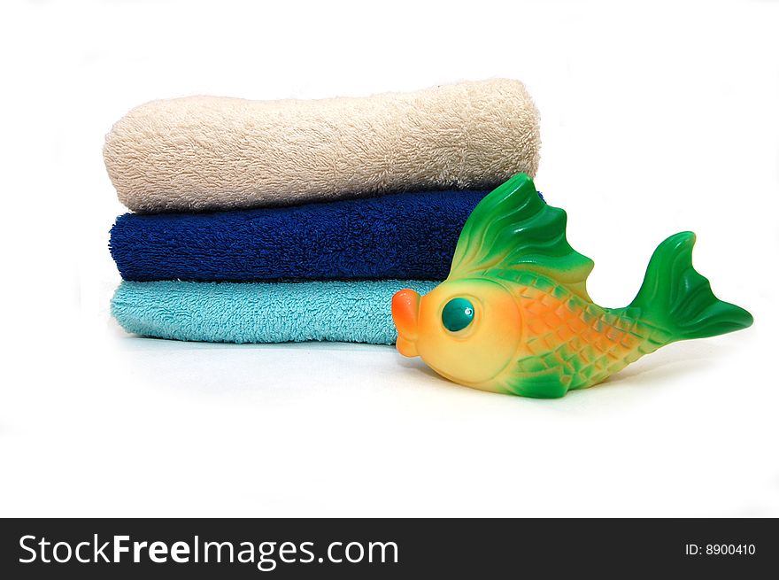 The combined colour towels with a toy Fish