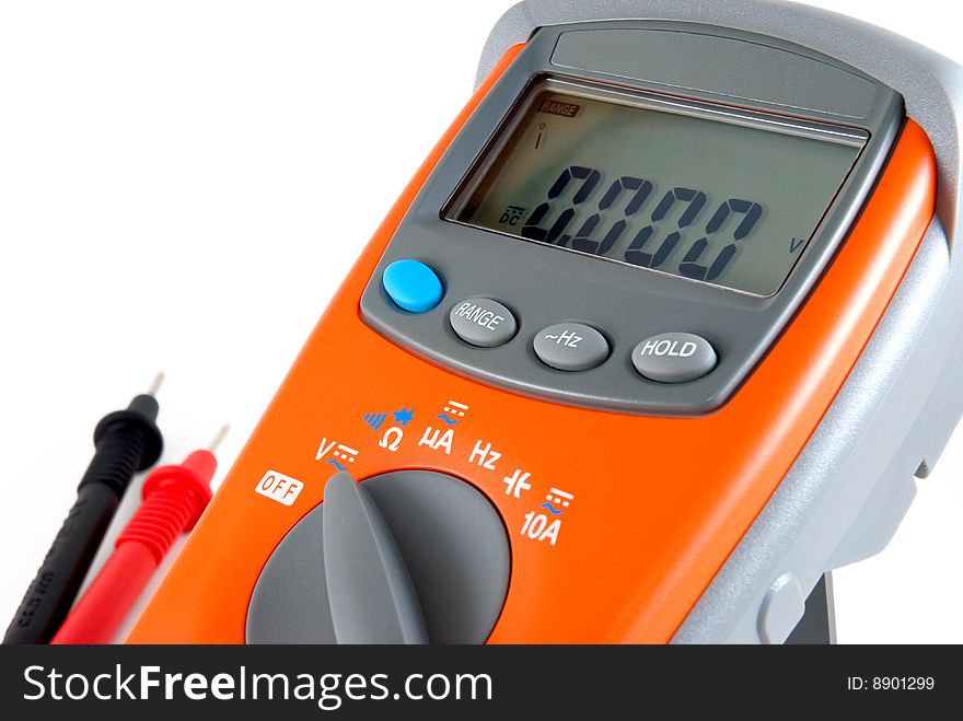 The orange multimeter is photographed on a white background