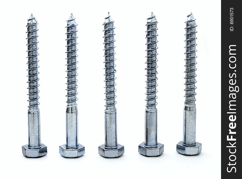 Five brilliant metal screws on a white background