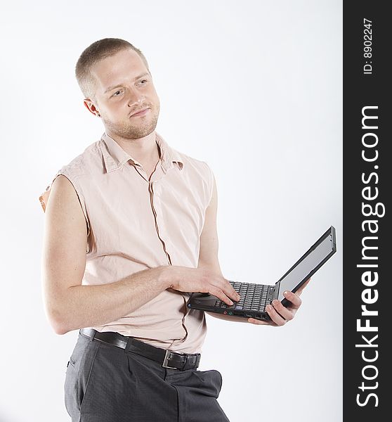 Smiling man in shirt with notebook