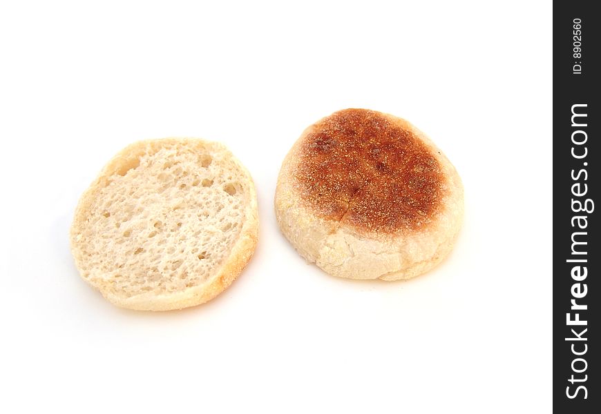 Plain white english muffin isolated over white background