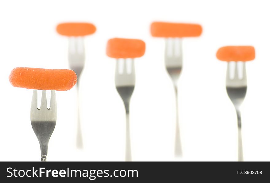 Composition of carrots and forks with blur DOF effects. Composition of carrots and forks with blur DOF effects