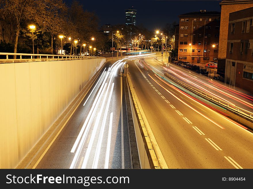 Rush of night time traffic on road in barcelona, spain. Rush of night time traffic on road in barcelona, spain