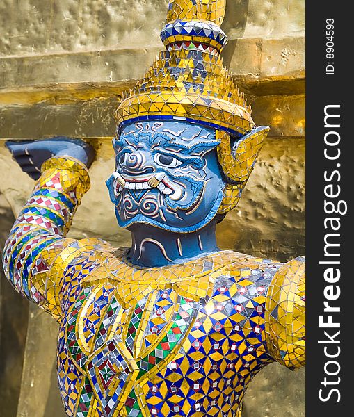 Mythic creature Rakshas statue at the Wat Phra Kaeo (Temple of Emerald Buddha), Bangkok, Thailand