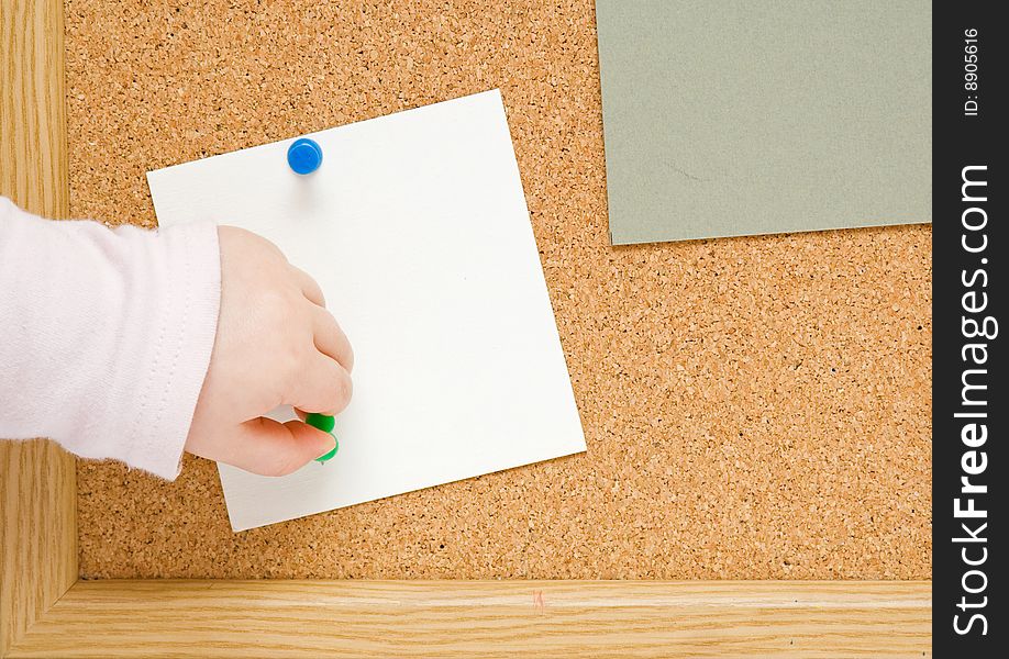 Brown corkboard with important message