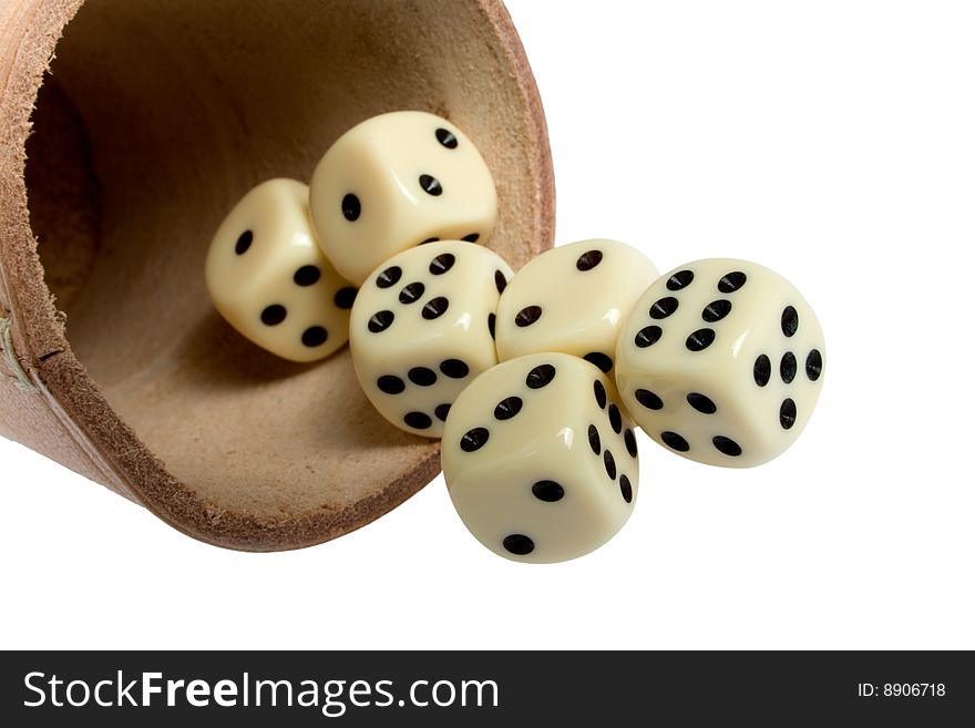 Dice cup and dice on background