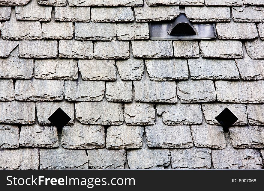 Cover the roof with stone slate. Cover the roof with stone slate