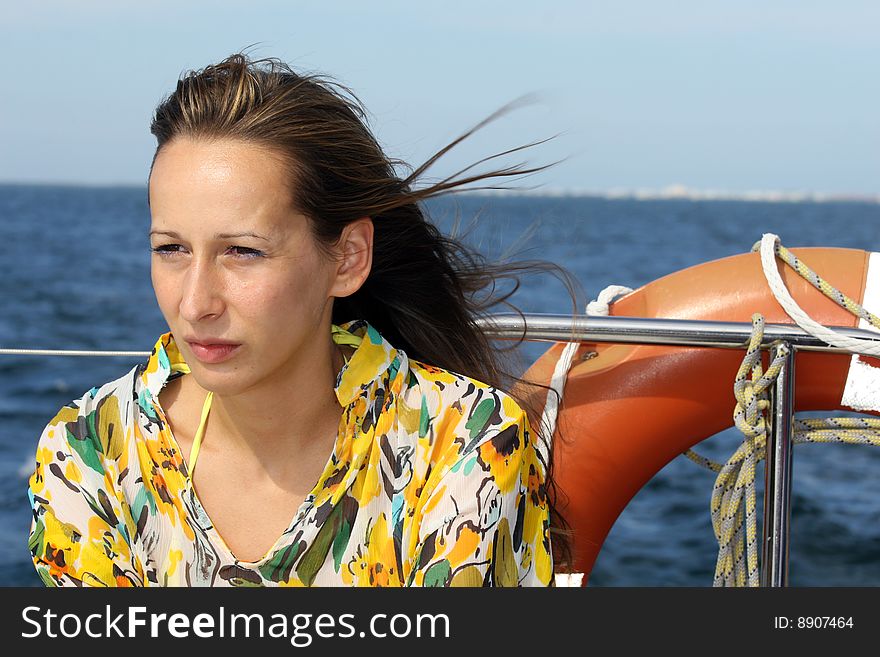 Woman on the boat in caribbean sea