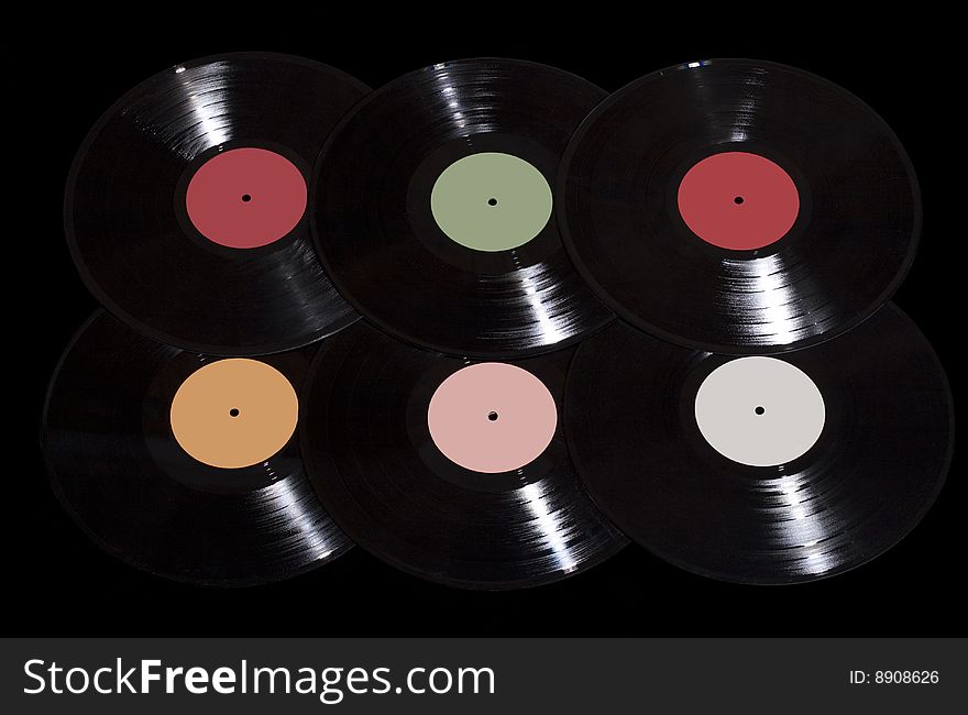 6 vinyl records on black background