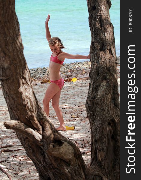 Girl doing fitness on the beach