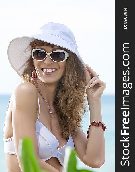 Portrait of beautiful girl having good time on tropical beach. Portrait of beautiful girl having good time on tropical beach