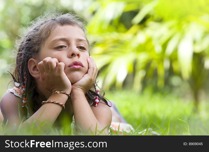 Portrait of little girl having good time in summer environment. Portrait of little girl having good time in summer environment